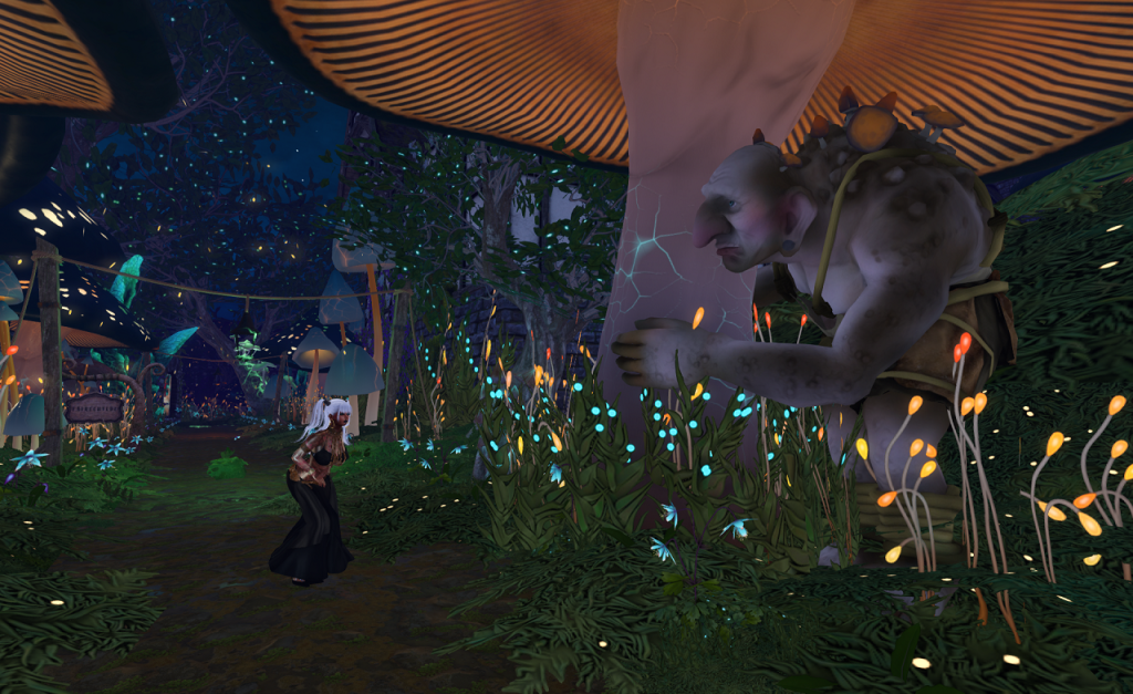 A troll, with fungus growing out of his back, hides behind the stalk of a tree sized mushroom as a woman with long white hair and wearing a black belly dancing outfit cautiously approaches him from the left. In the foreground, tall grass height glowing tendrils of other fungi rise up. At the left, behind the woman, a path goes off into the distance. It is bordered with softly glowing blue flowers. Other tree sized mushrooms of various varieties can be seen in the distance.