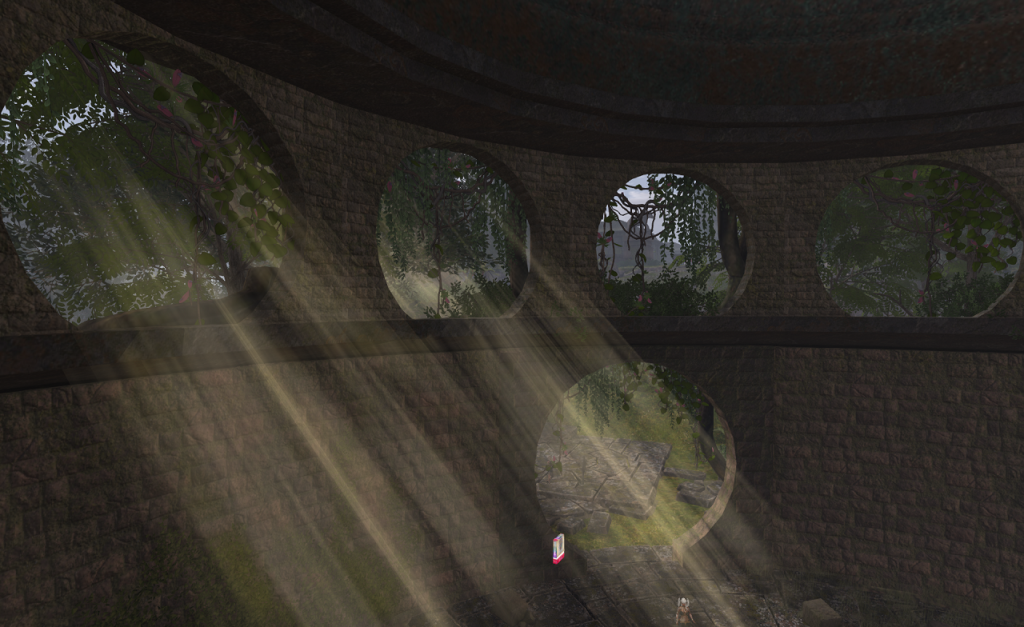 A view from inside a vast, circular stone temple. Sunlight streams in through two of the large round windows just below the bottom of the dome. More jungle can be seen through two more windows. Below, a round archway leads to the broken paving of the plaza outside.